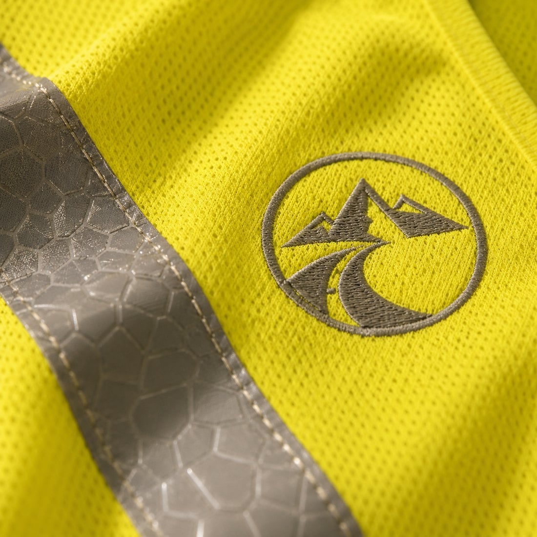 Reflective stripe and embroidered emblem detail