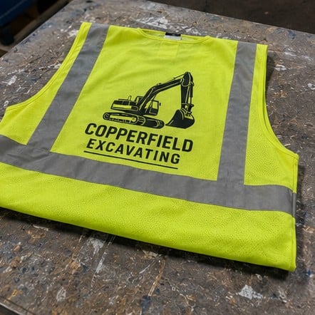 Reflective vest company uniforms on a rack